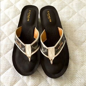 Coach slightly used brown slippers size 7